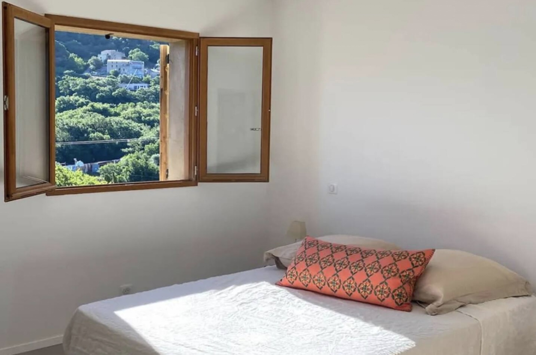 casa-paraso_corsica-france_bedroom-window.jpg