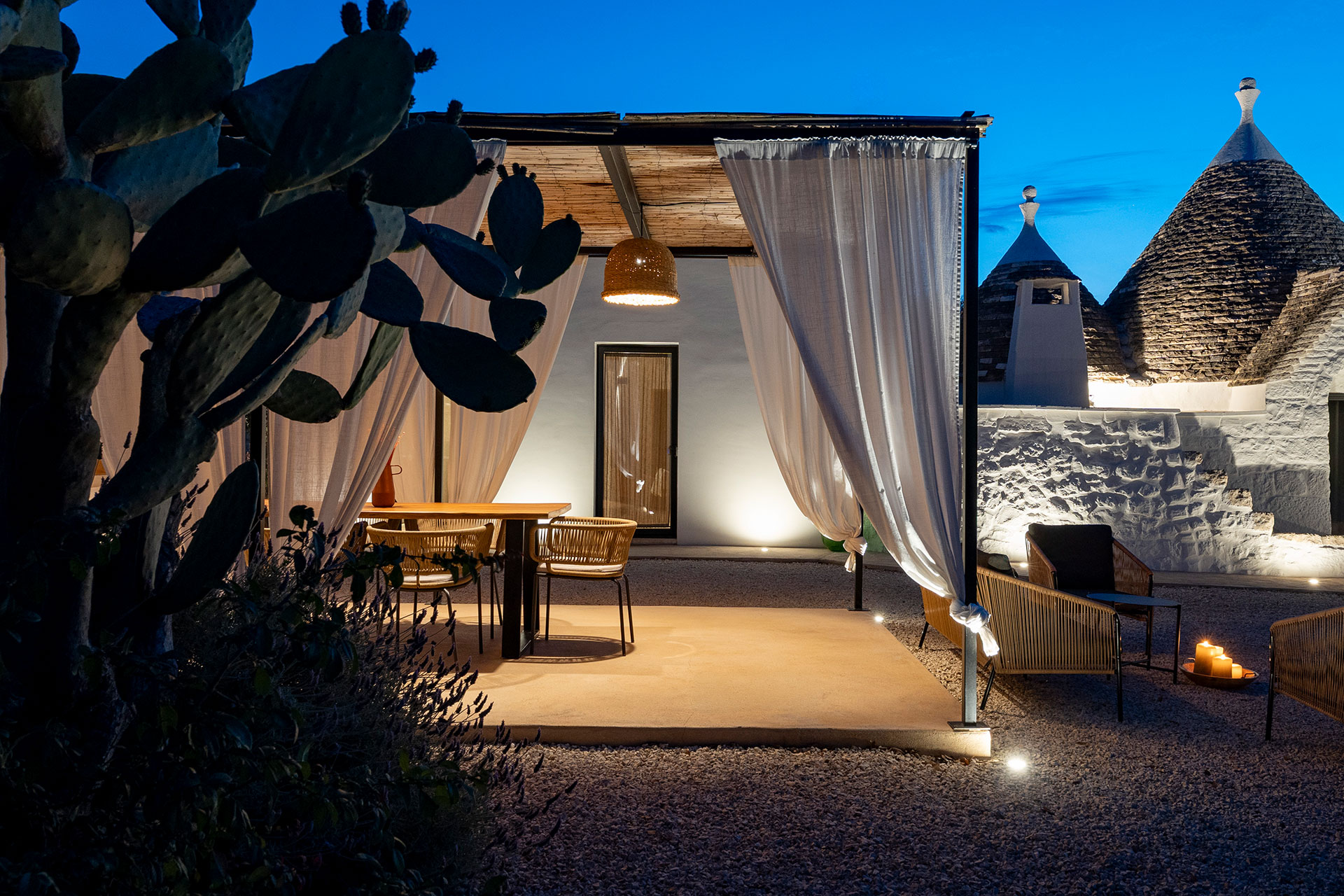 trulli-petramyrta_trullo_puglia-italy_exterior-terrace-night-sofa.jpg
