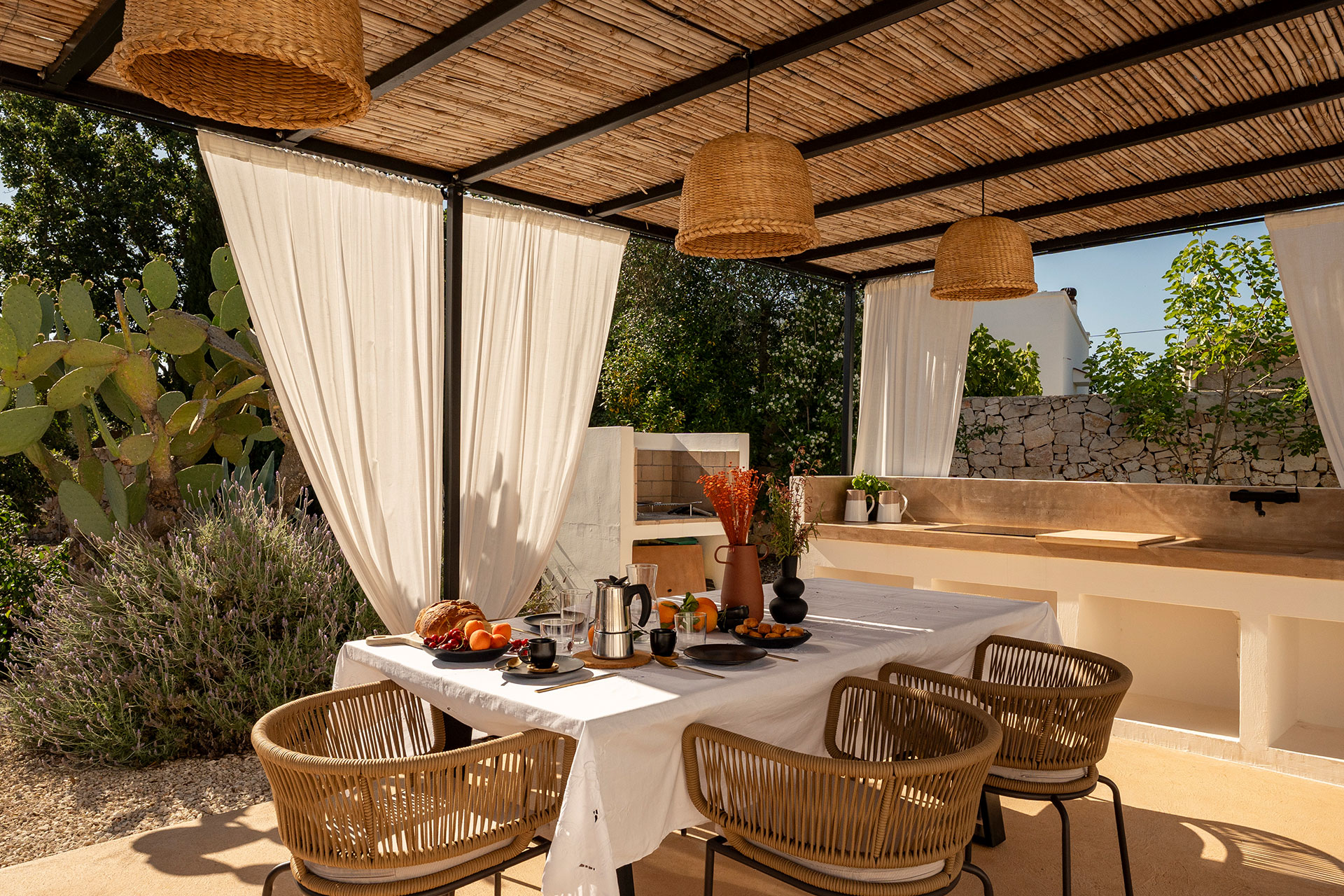 trulli-petramyrta_trullo_puglia-italy_exterior-terrace-table.jpg