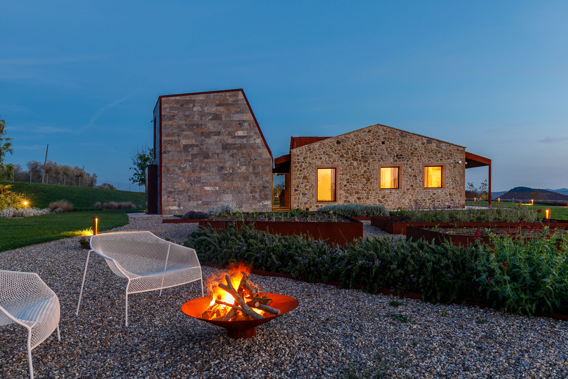 villa-volterra_country-house_tuscany-italy_exterior-fireplace.jpg