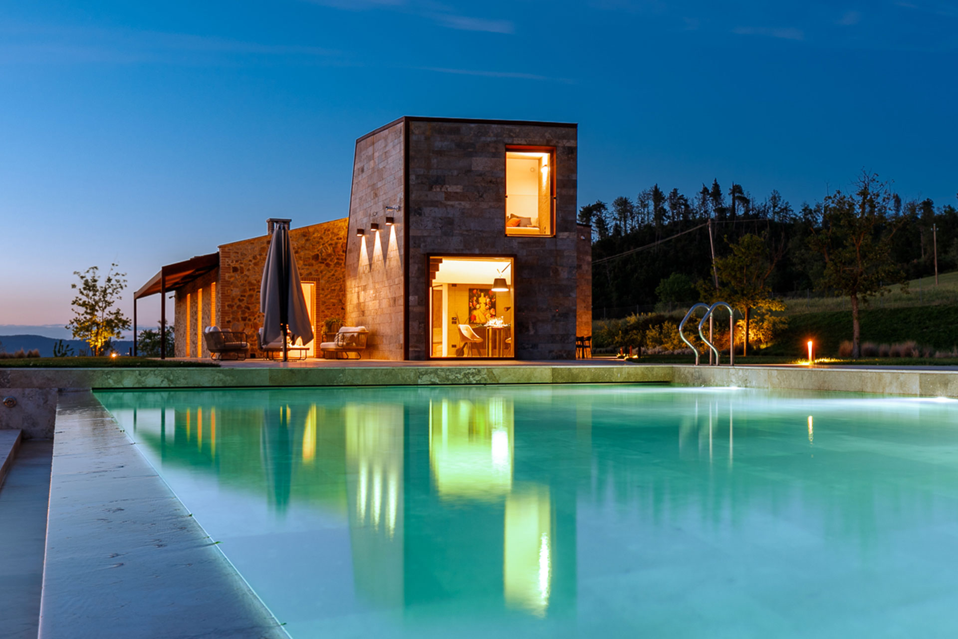villa-volterra_country-house_tuscany-italy_exterior-pool-night.jpg