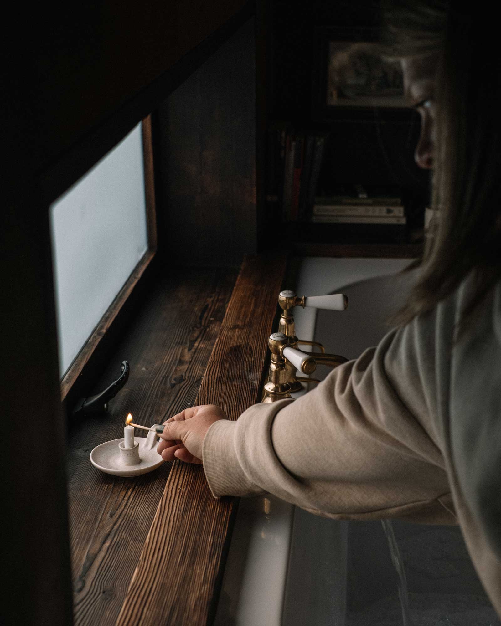 hergest-lee_cabin_wales-united-kingdom_lean-to-interior-candle.jpg