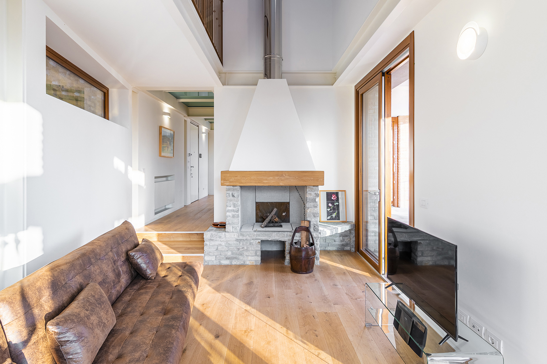 le-langhe_villa_piedmont-italy_interior-living-room-fireplace.jpg
