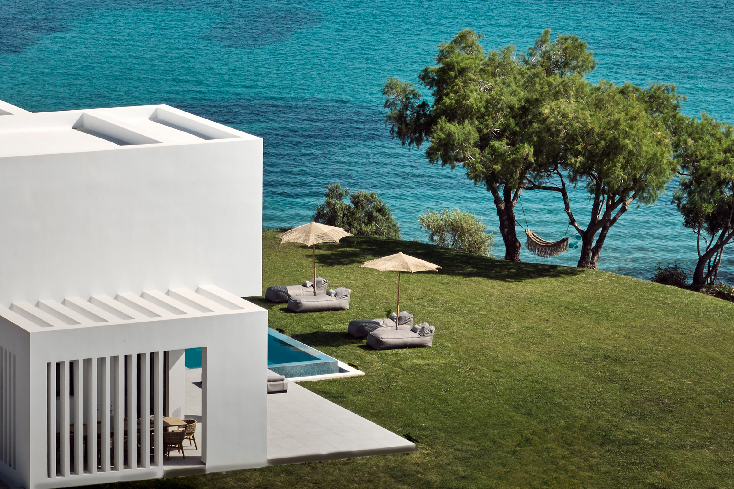 https://boutique-homes-prod.sfo3.cdn.digitaloceanspaces.com/properties/3658/omnia-villa_greece_exterior-view-1709236804241.jpg?tr=w-900