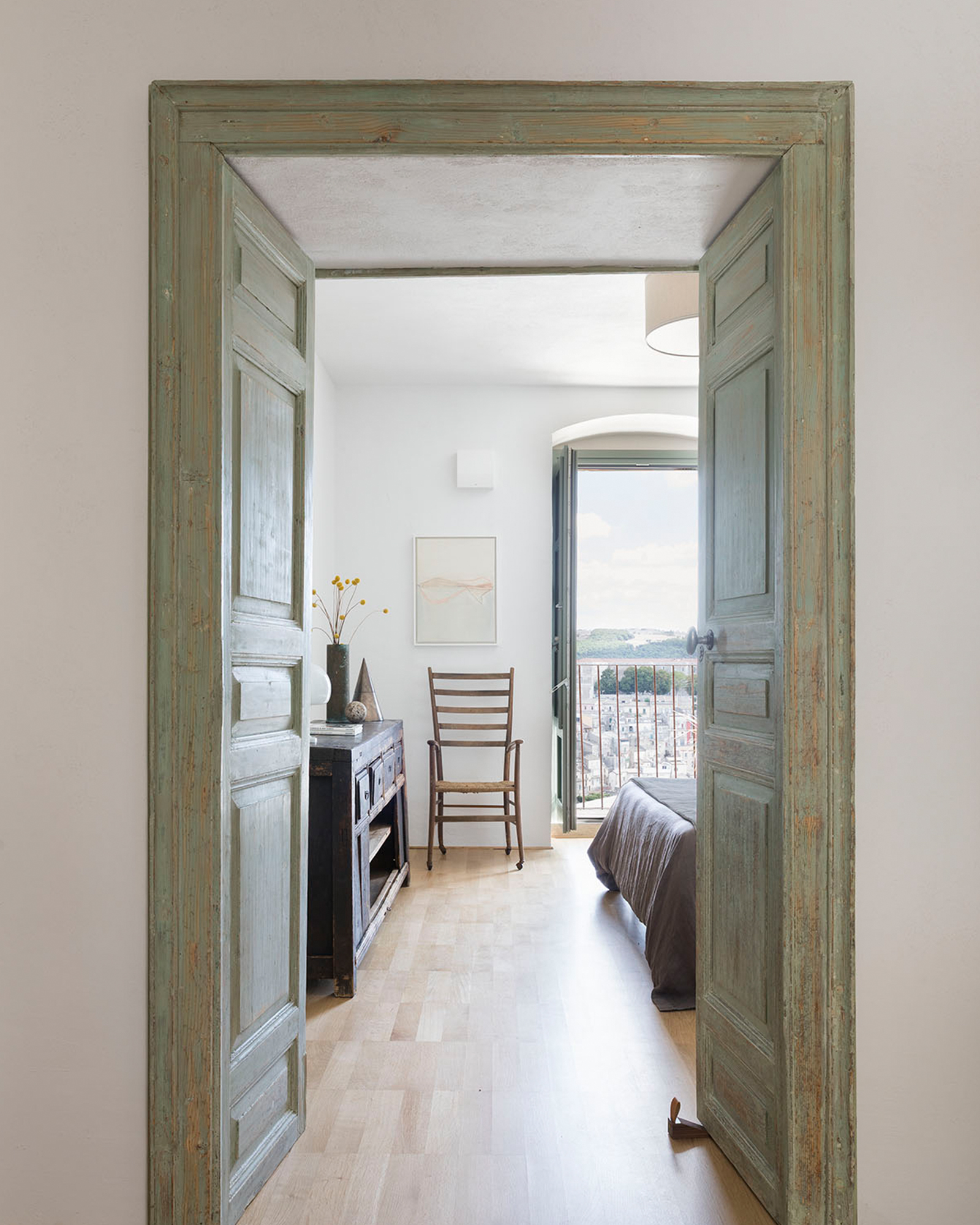 casa-valentine_townhouse_sicily-italy_interior-bedroom-entrance.jpg
