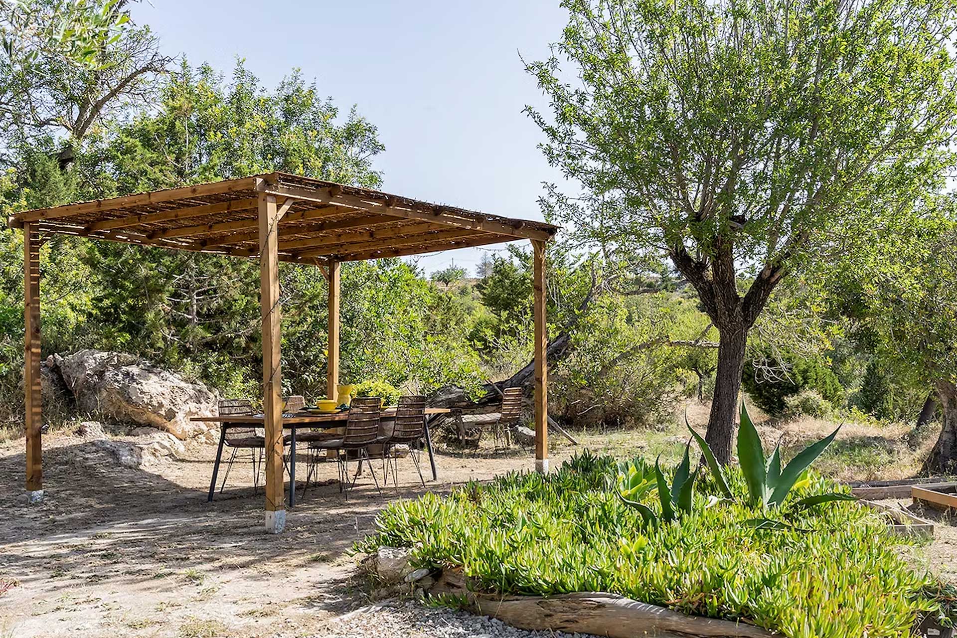the-finca-at-san-vicente_farmhouse_Balearic-Islands-spain_exterior-terrace-table.jpg