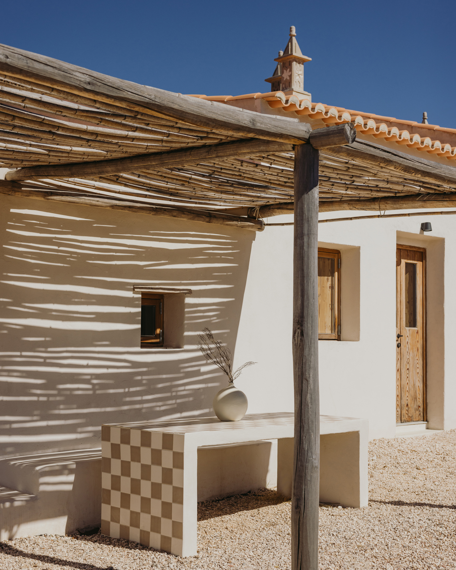 maybe-october_farmhouse_faro-district-portugal_exterior-facade-shadow.jpg
