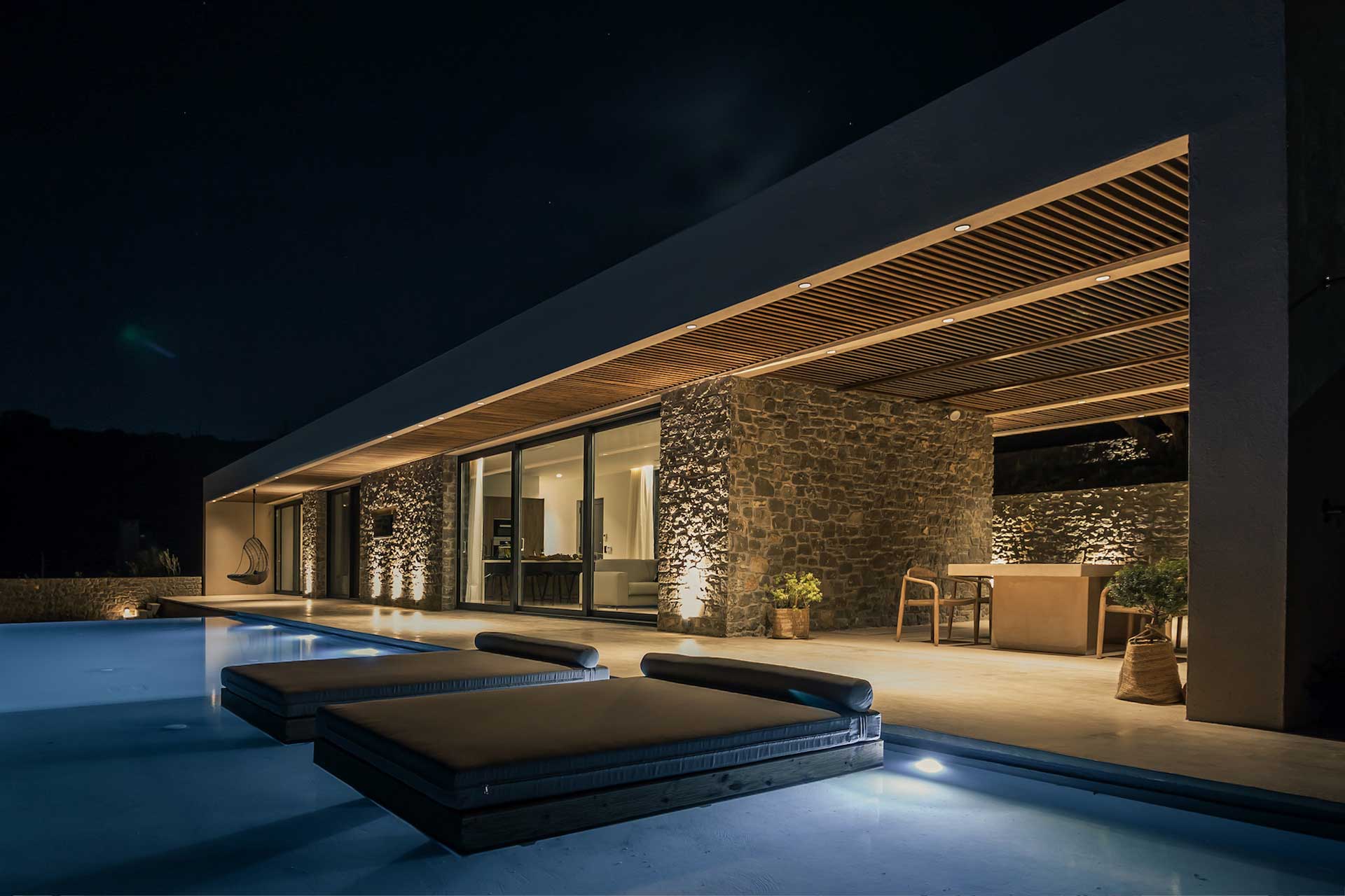 nuez-villas-ground-level-villa_villa_crete-greece_exterior-night-pool.jpg