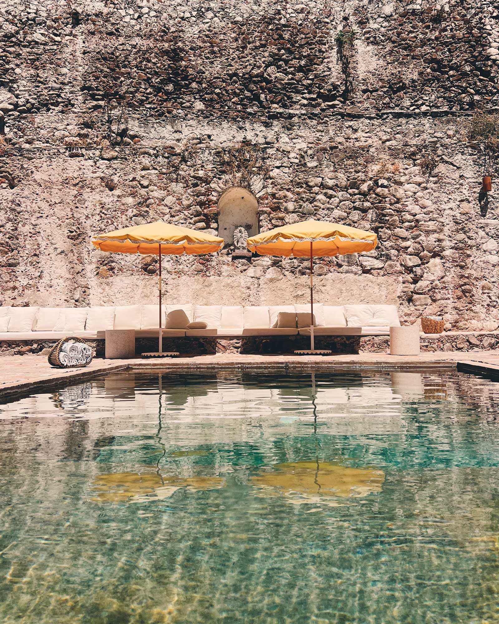 hacienda-el-aguacate_house_tequisquiapan-queretaro-mexico_exterior-pool-seating.jpg