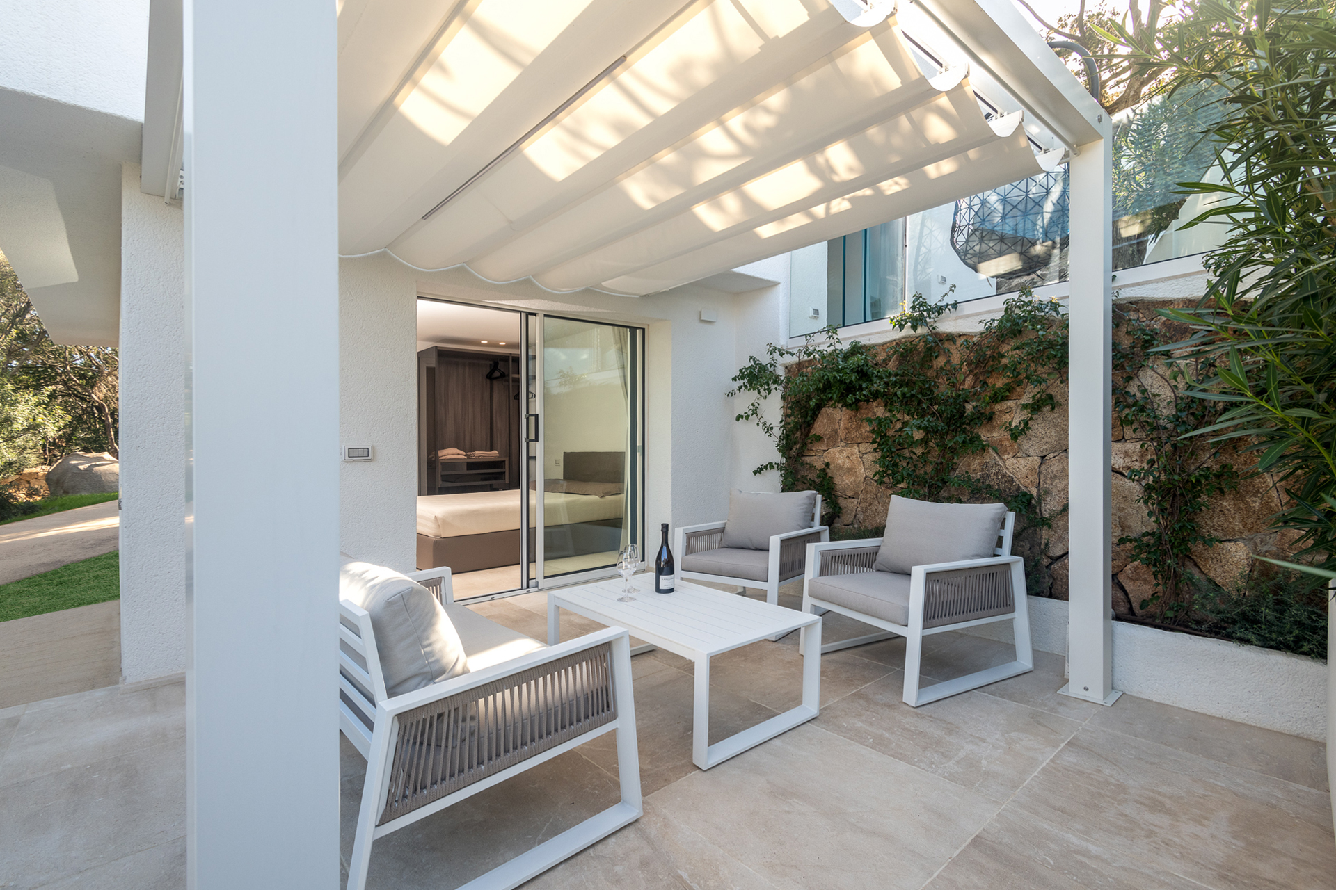 villa-bianca-porto-rotondo_estate_sardegna-italy_exterior-bedroom-terrace-wine.jpg