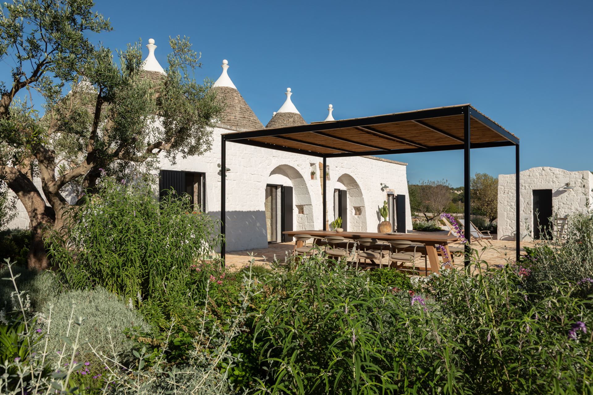 trulli-ottocappelli_villa_apulia-italy_exterior-terrace.jpg