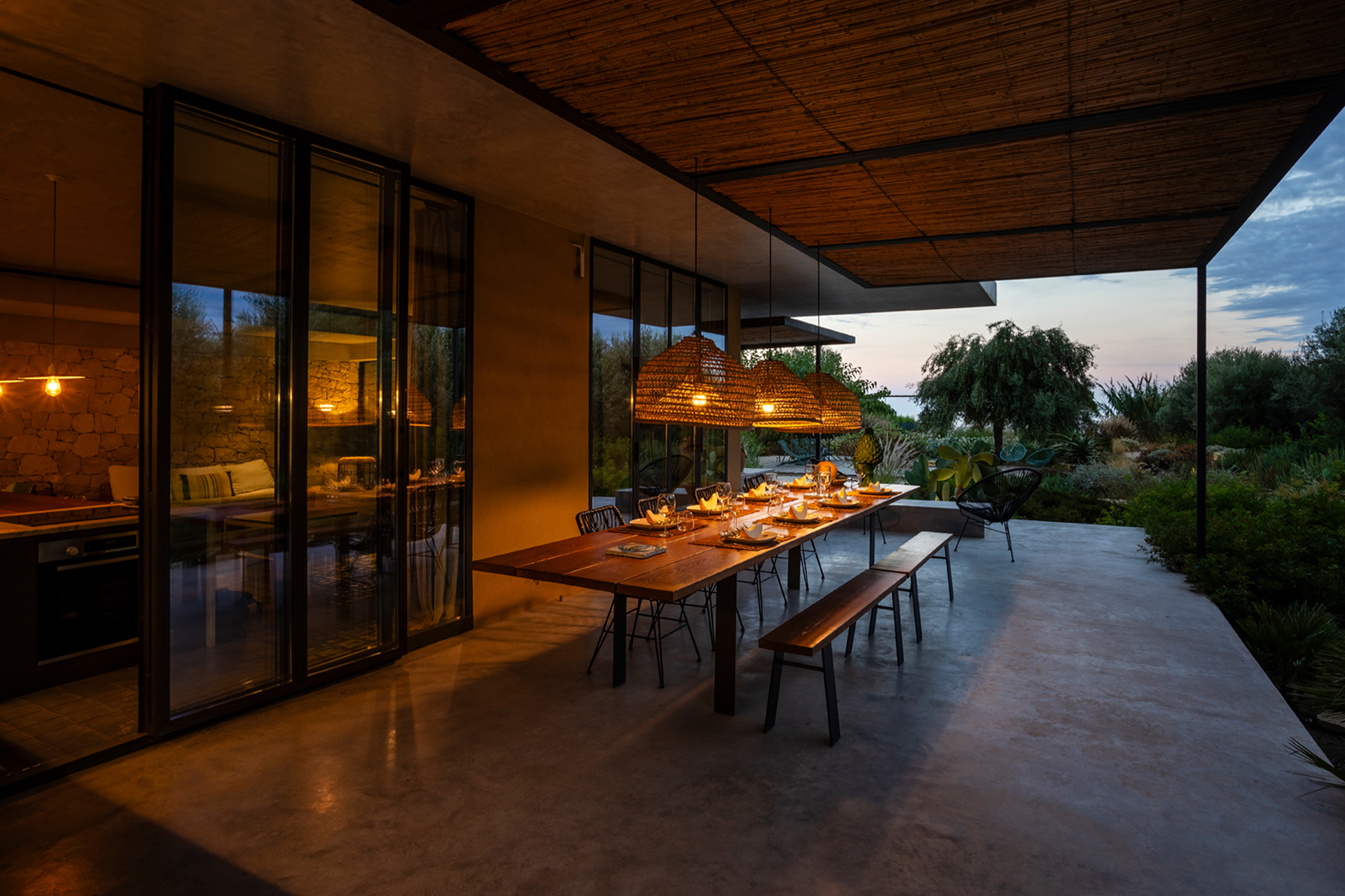 cala-due-seafront-villa_villa_sicilia-italy_exterior-terrace-night-table.jpg