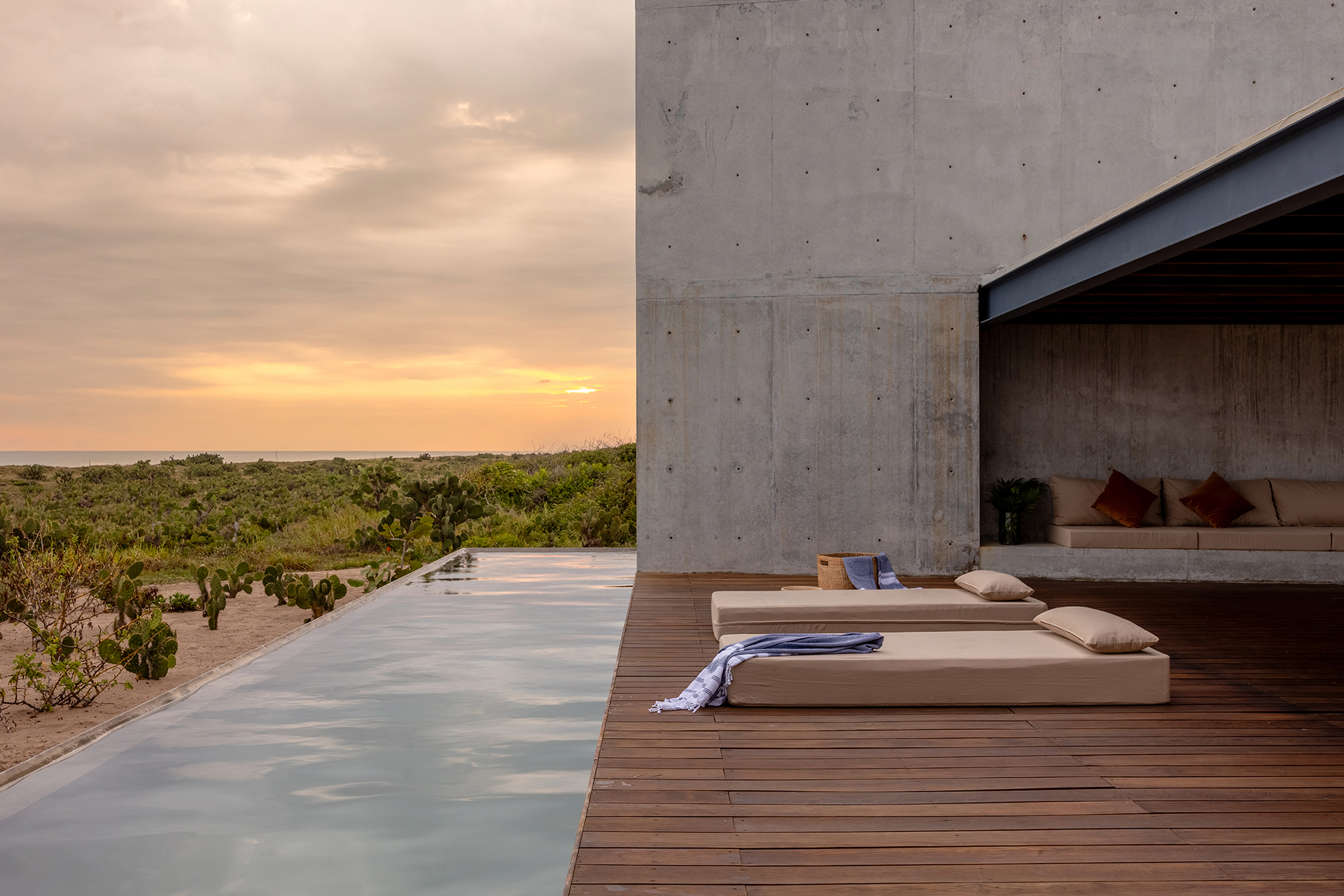 tropical-brutalist-oceanfront-villa_villa_oaxaca-mexico_exterior-sunset.jpg