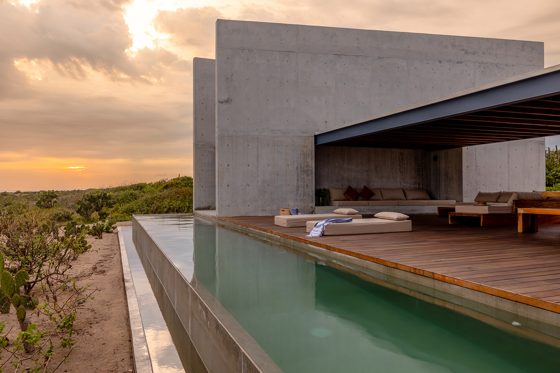 tropical-brutalist-oceanfront-villa_villa_oaxaca-mexico_exterior-sunset-facade.jpg