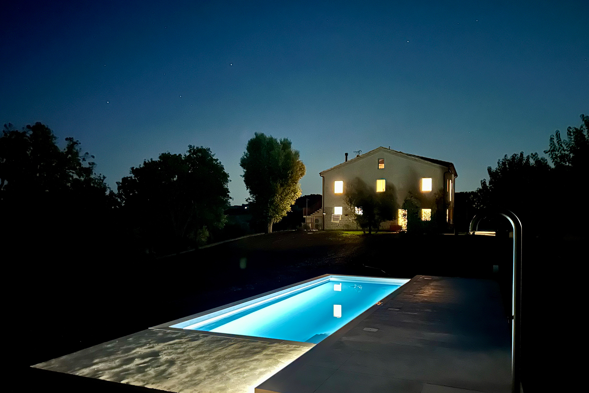 casa-fugiano_farmhouse_marche-italy_exterior-night-pool.jpg