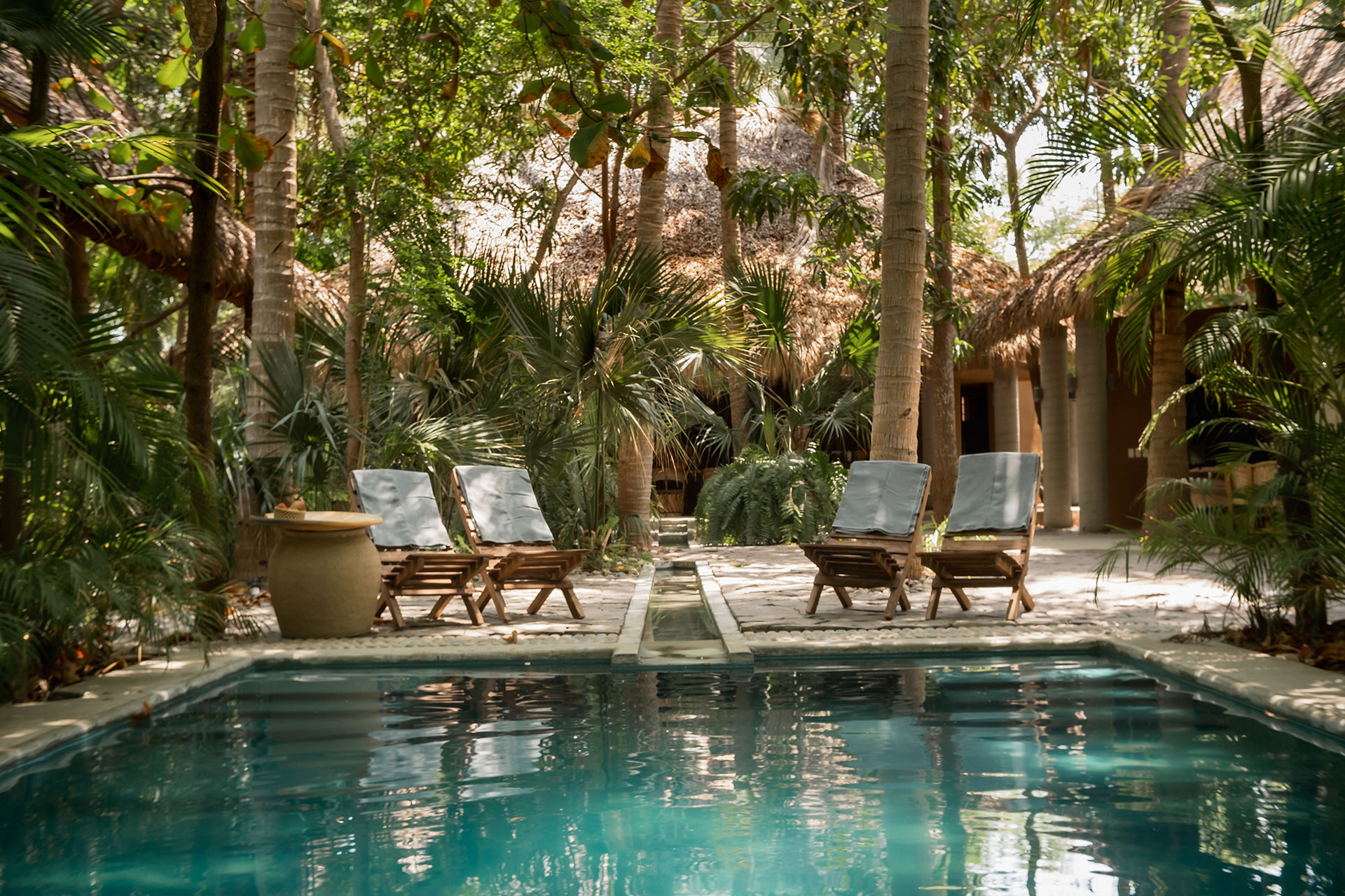 el-palmar_villa_oaxaca-mexico_exterior-pool-chair.jpg