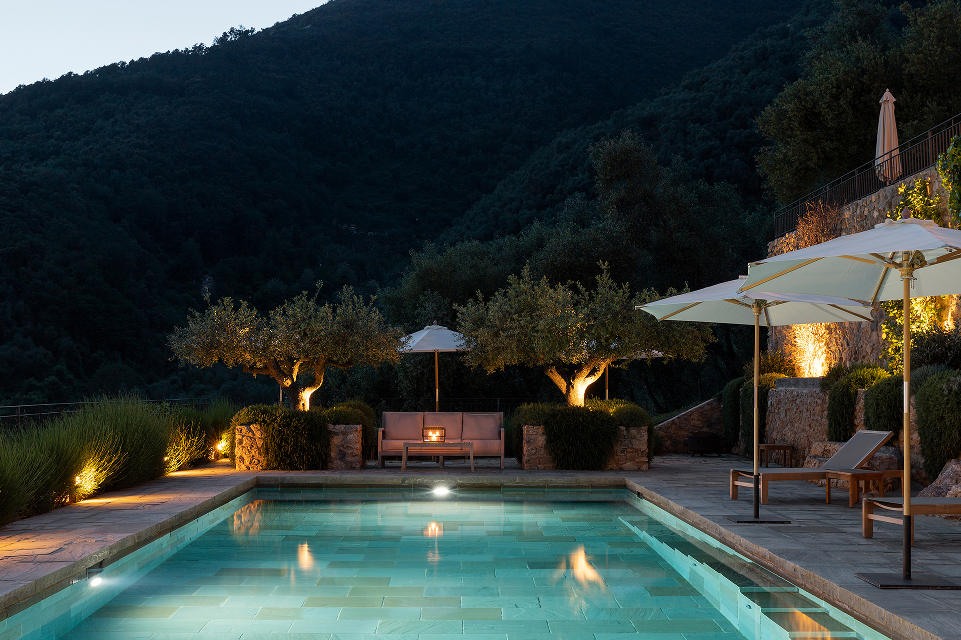 villa-tomeoni_farmhouse_tuscany-italy_exterior-night-pool.jpg