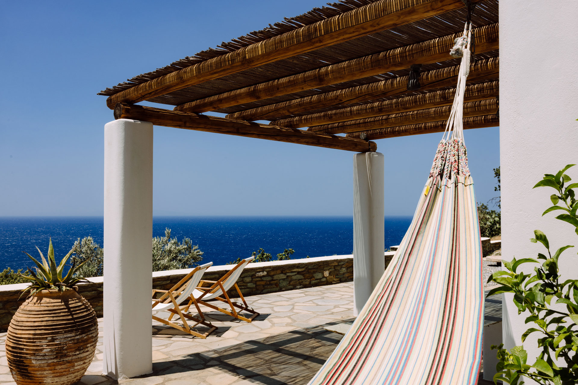 villa-riza_villa_andros-greece_exterior-hammock-view.jpg
