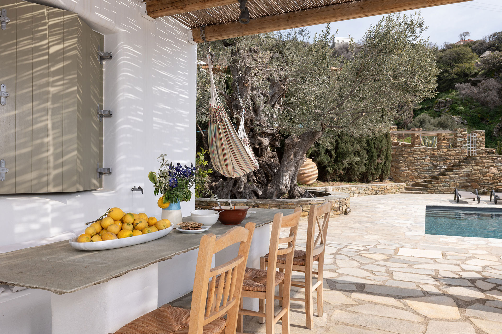 villa-riza_villa_andros-greece_exterior-terrace-design.jpg