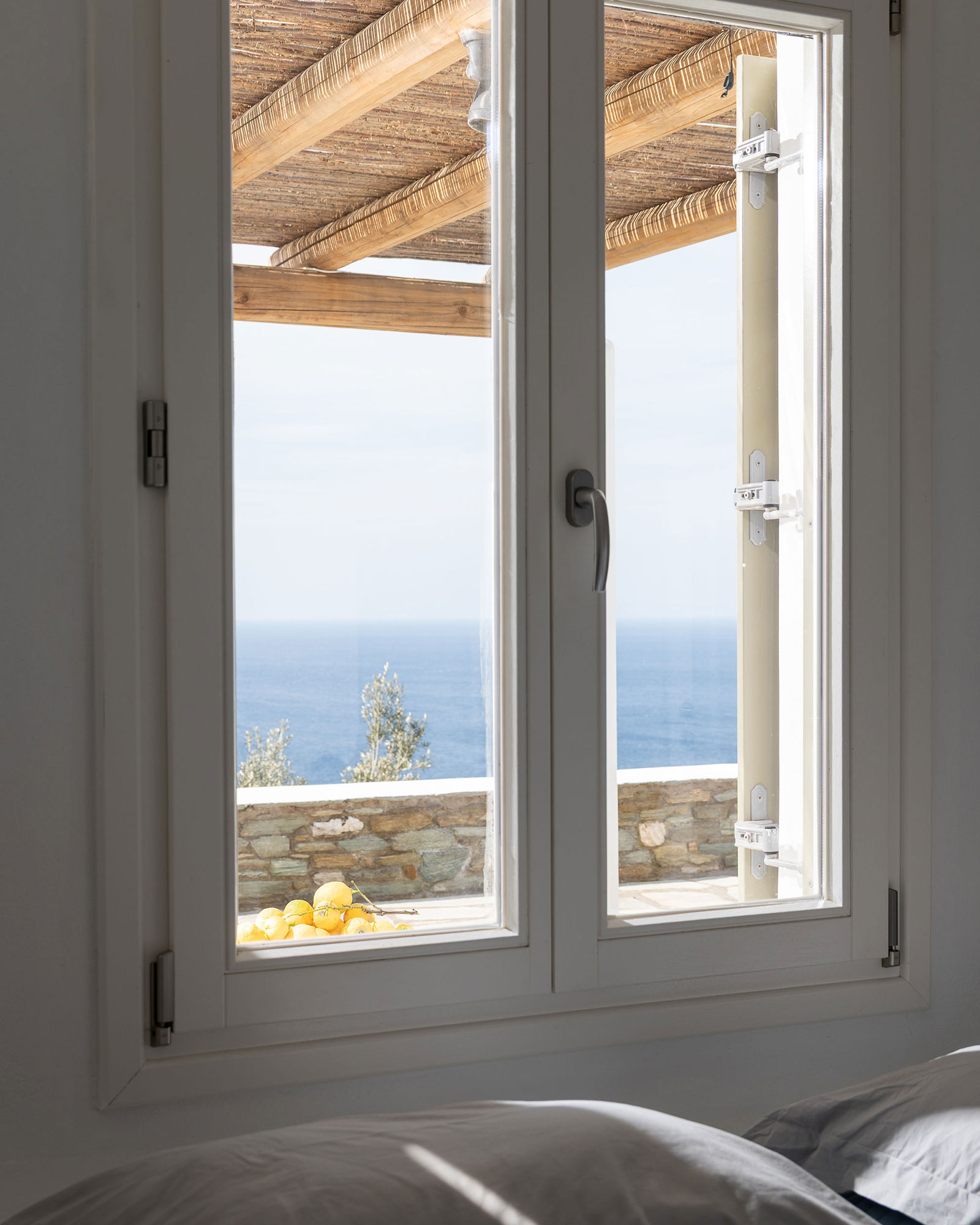 villa-riza_villa_andros-greece_interior-bedroom-window.jpg