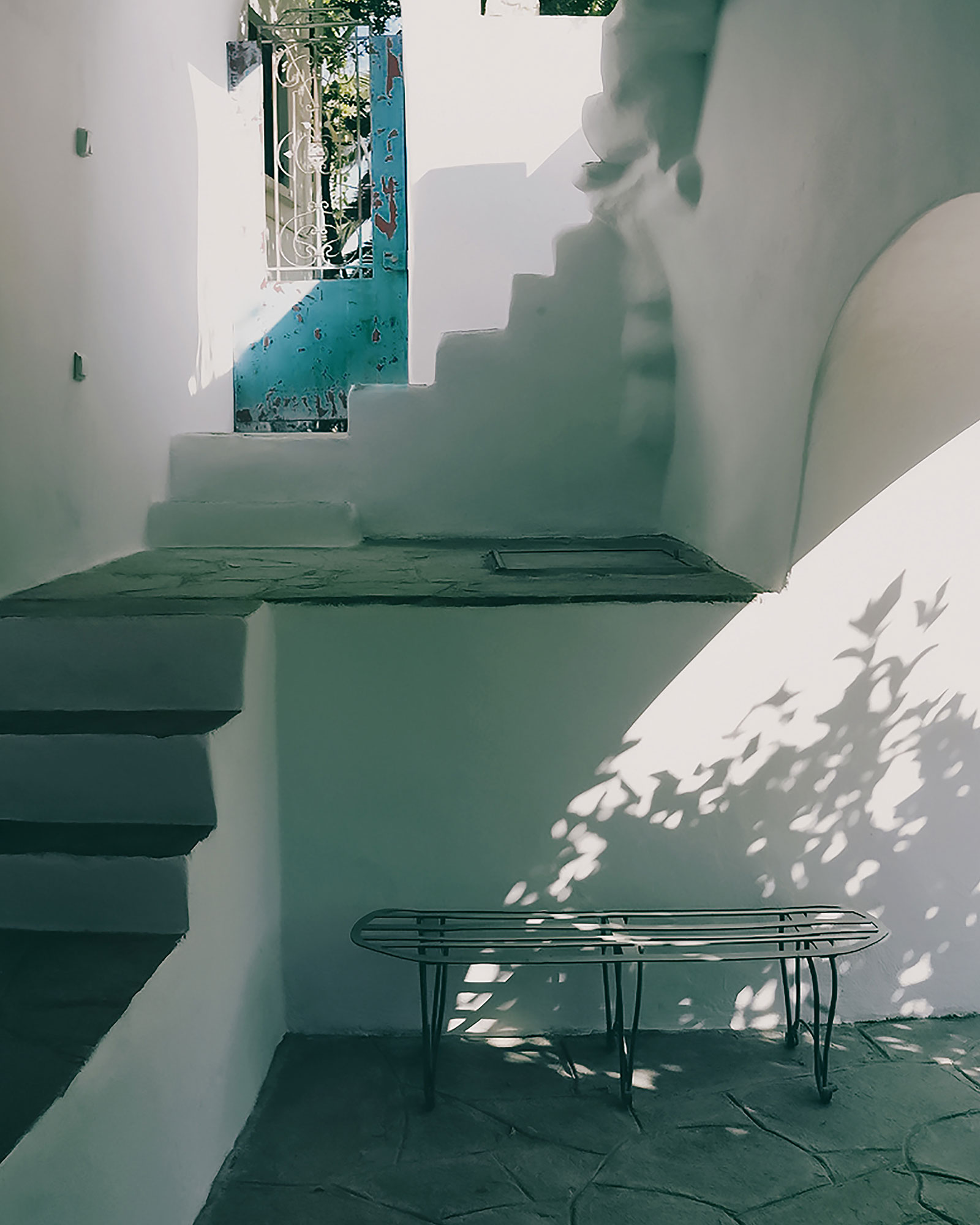 helios-cycladic-stone-house_house_tinos-greece_exterior-bench.jpg