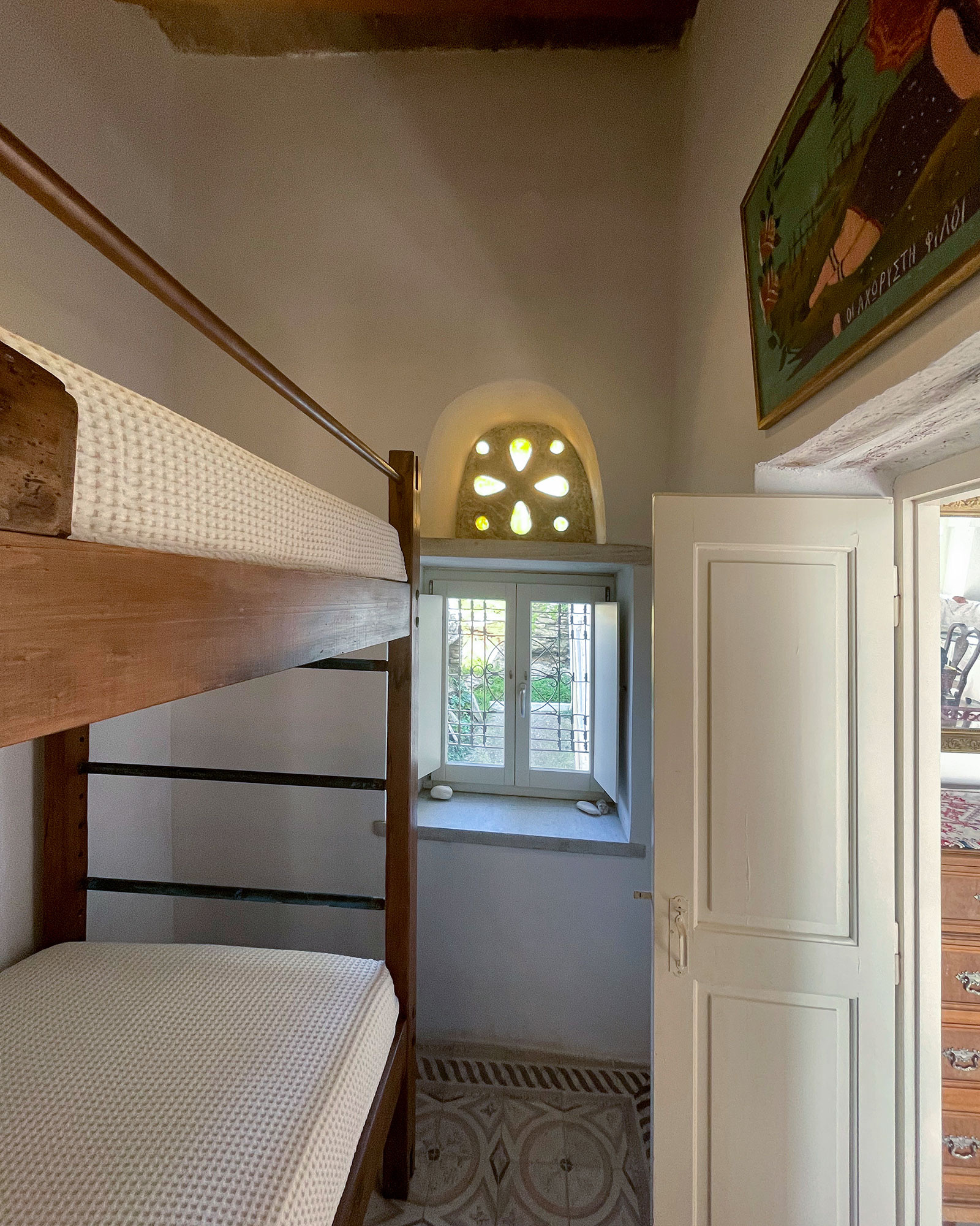 helios-cycladic-stone-house_house_tinos-greece_interior-bunk-beds-window.jpg