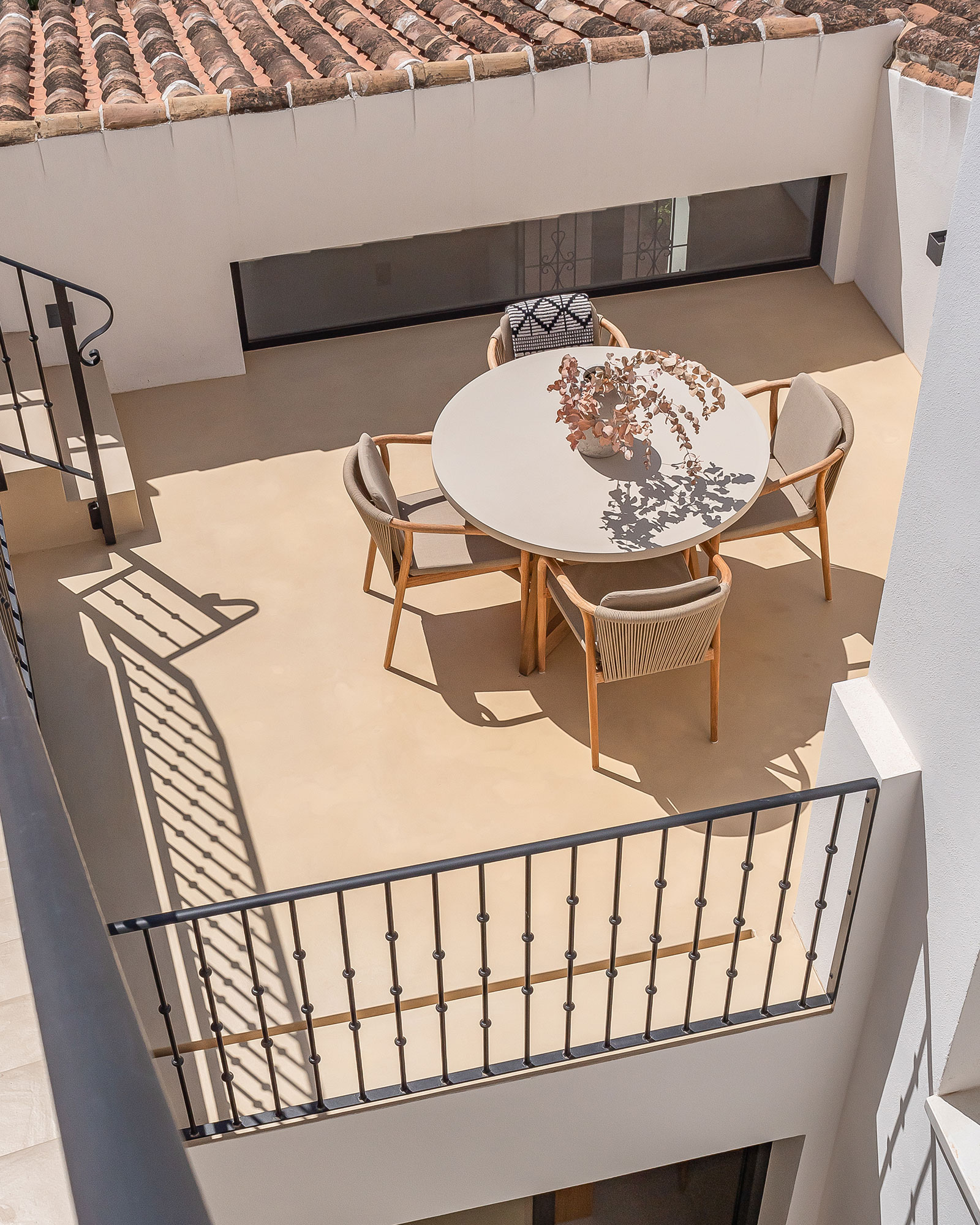 casa-luna-de-miel_townhouse_andalucia-spain_exterior-balcony-table.jpg