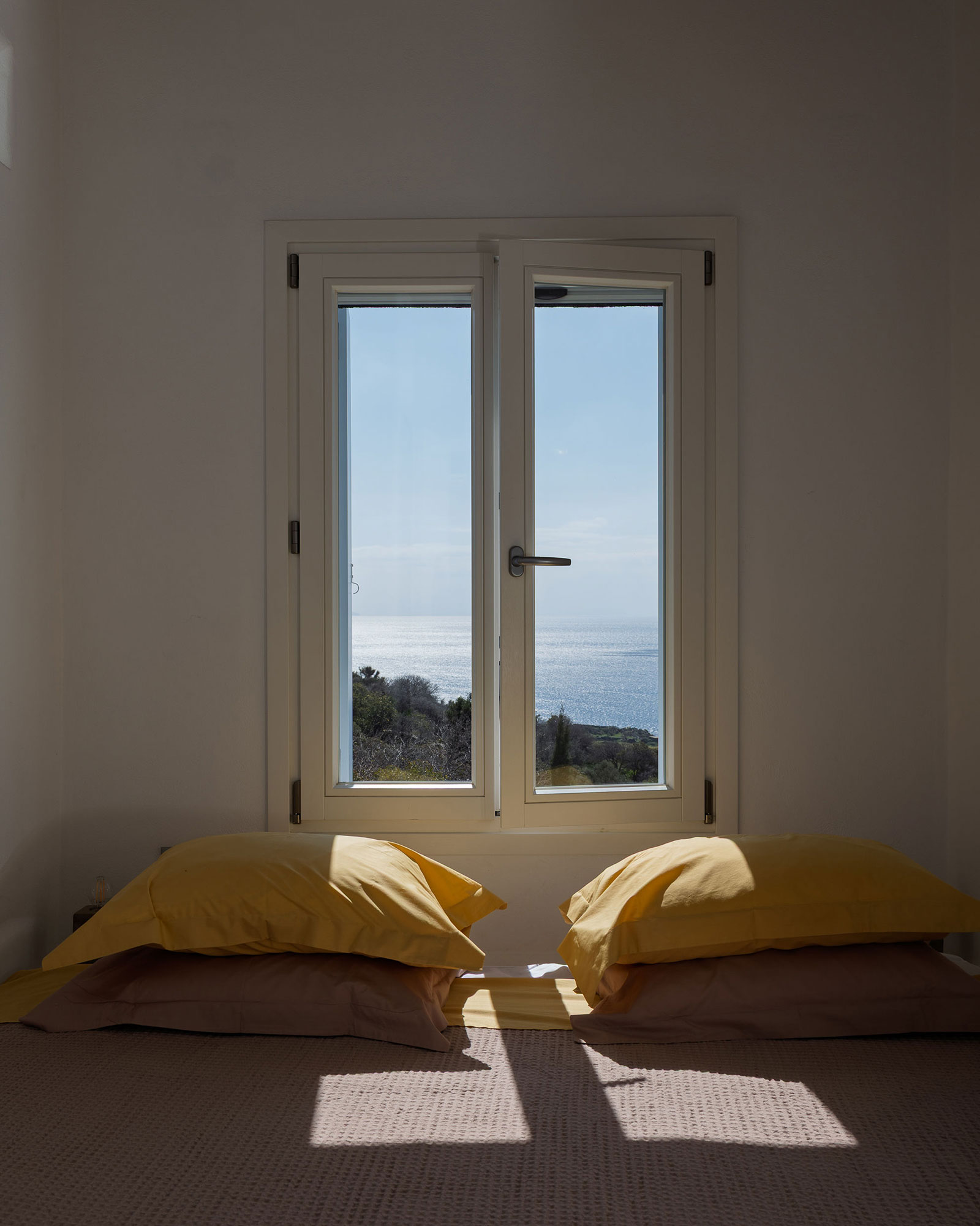 villa-petra_villa_andros-greece_interior-bedroom-window.jpg