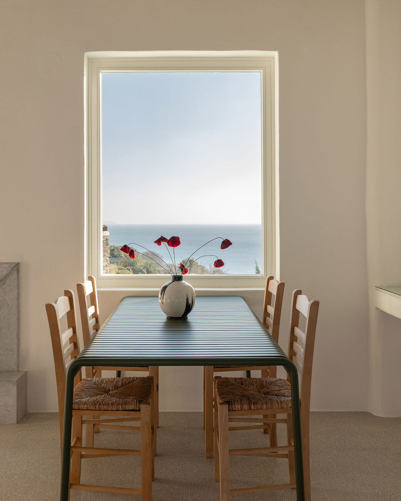 villa-petra_villa_andros-greece_interior-window-dining.jpg