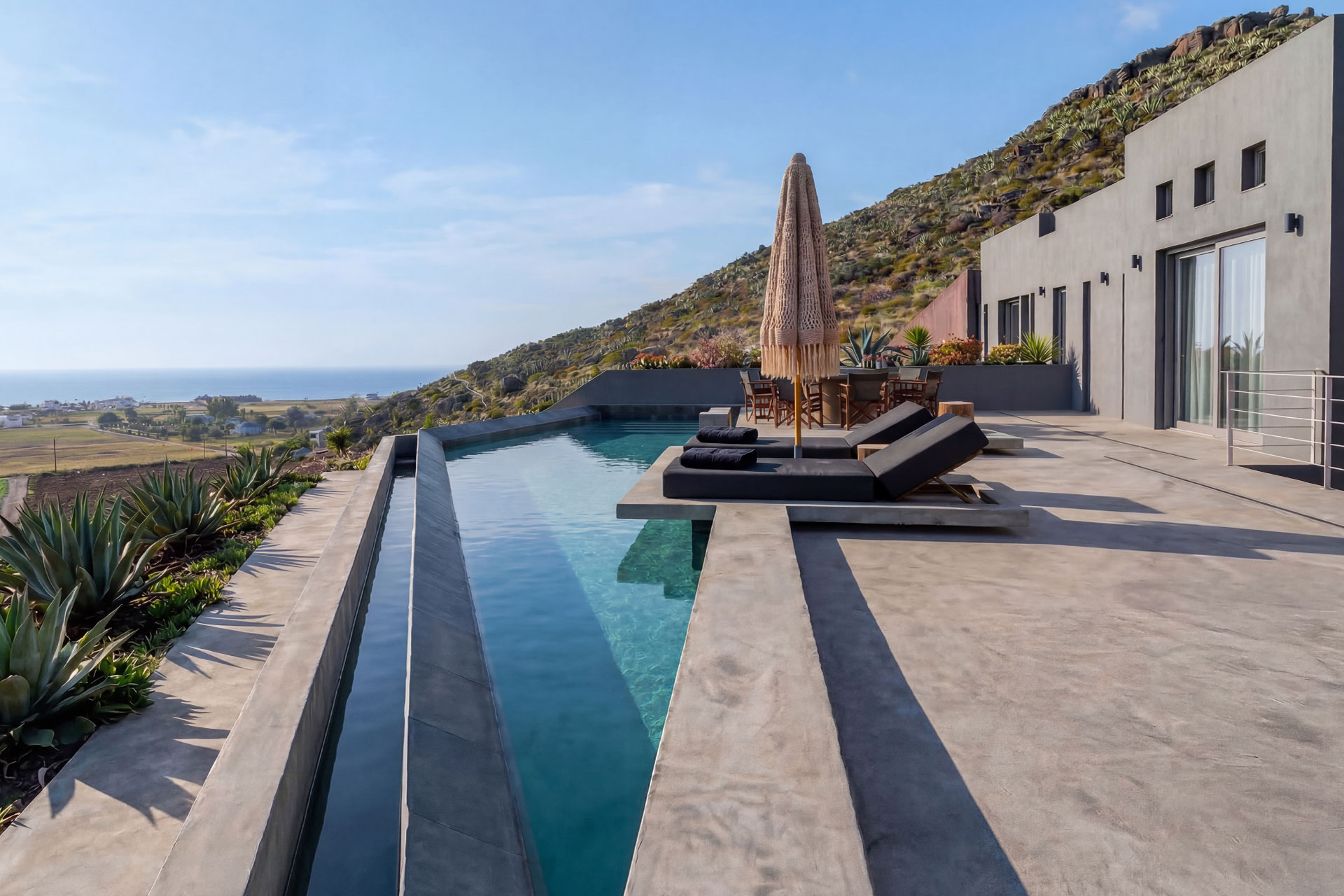 anzo-villas_villa_santorini-greece_triangle-art-villa_exterior-pool.jpg