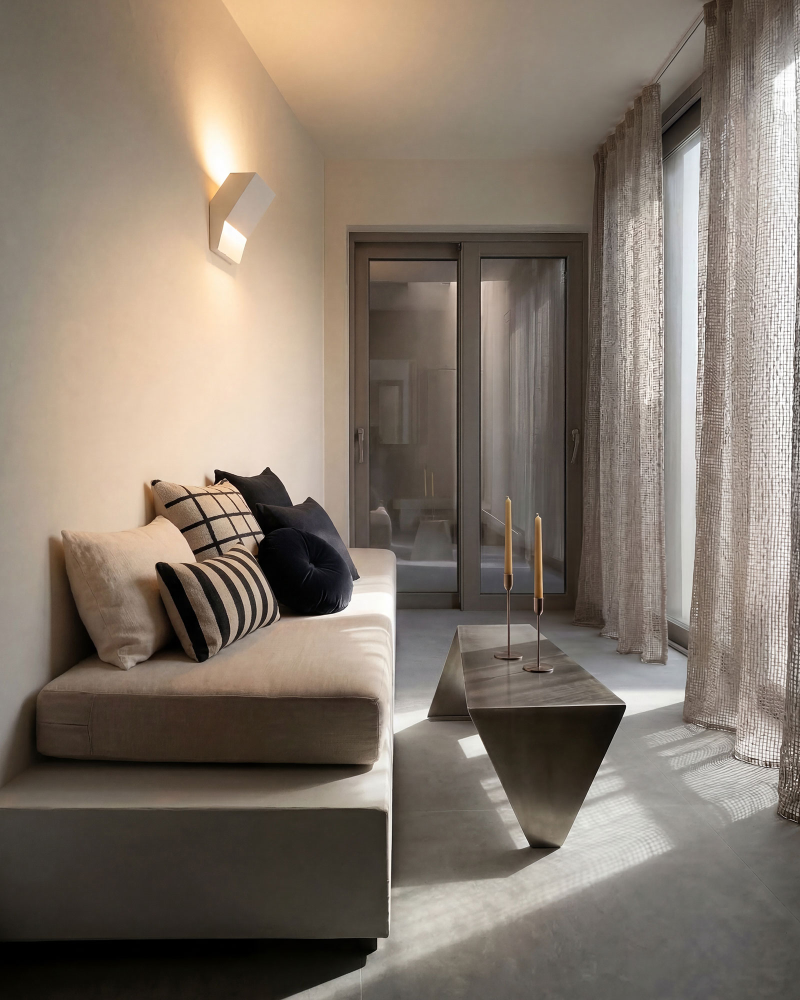 anzo-villas_villa_santorini-greece_triangle-art-villa_interior-sofa.jpg