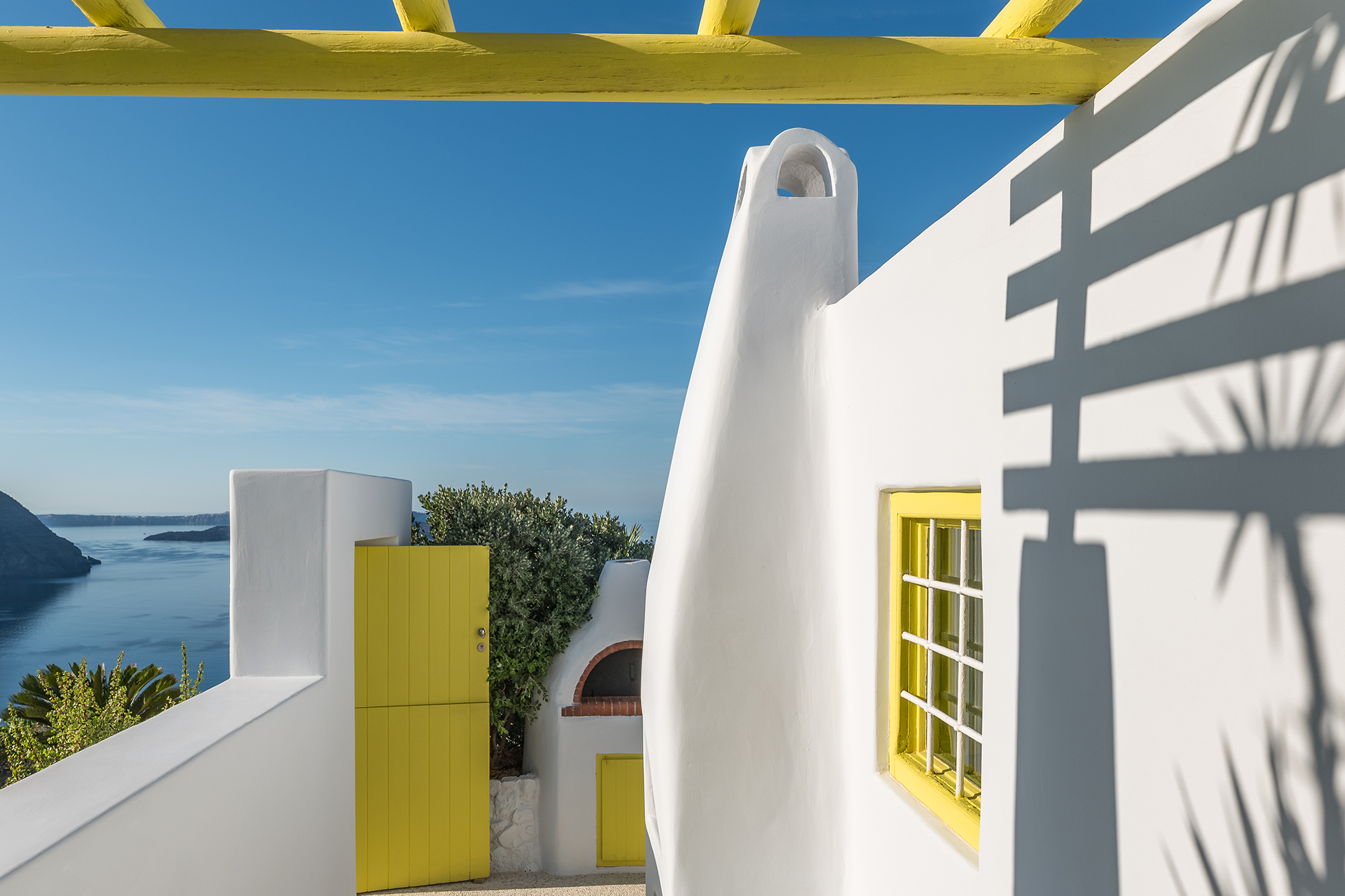 ftelari-villa_villa_oia-santorini-greece_exterior-yellow.jpg
