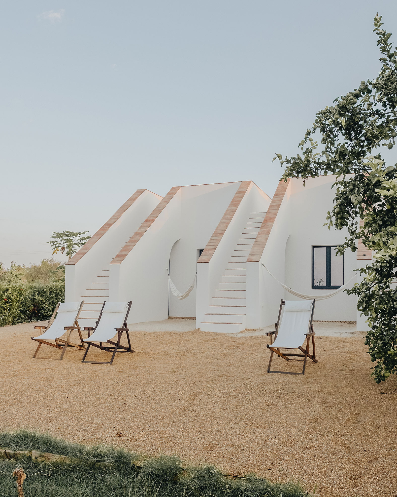 casa-modesta_small-hotel_faro-portugal_exterior-facade-design-plants.jpg